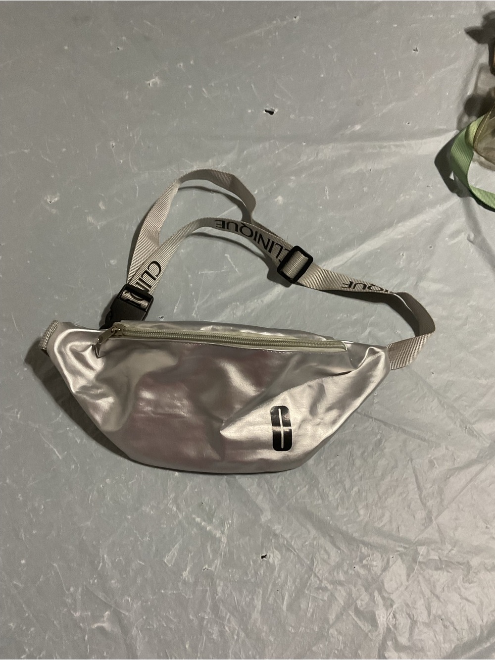 Clinique Iridescent Silver Crossbody Belt Bag